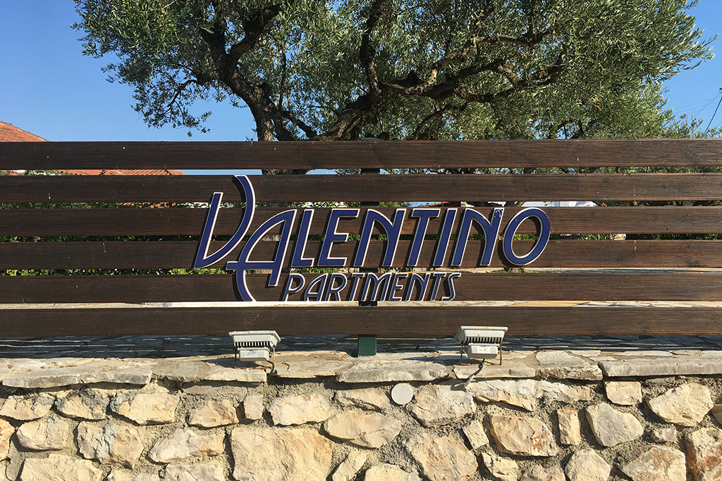 Valentino Apartments Logo