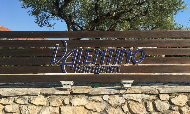Valentino Apartments Logo